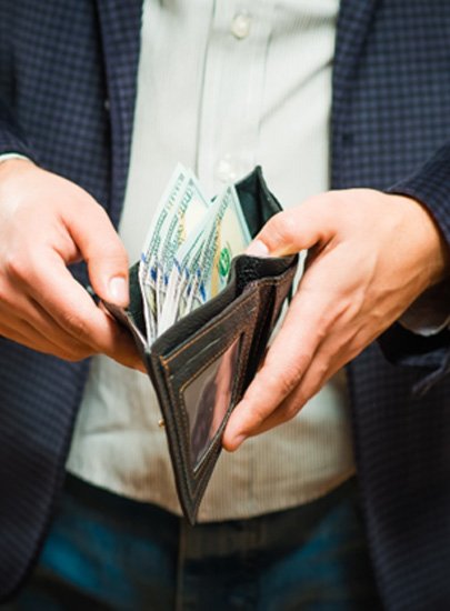 : a person in Chula Vista opening their wallet