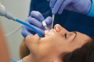 Patient having teeth cleaned.