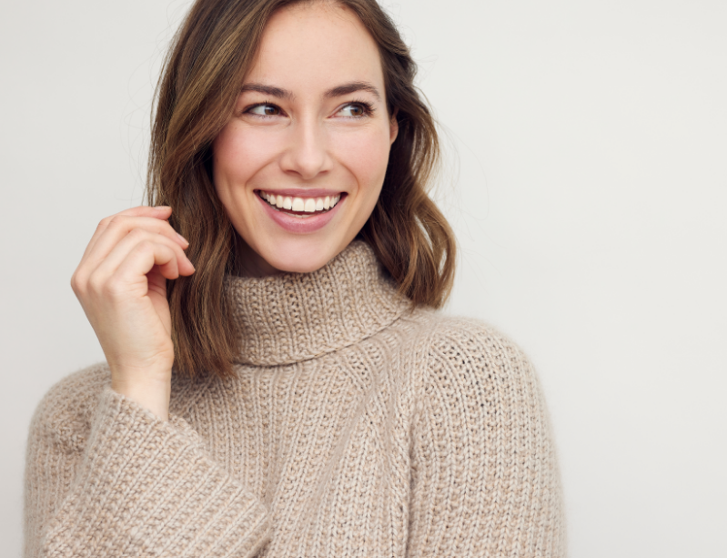Woman smiling.